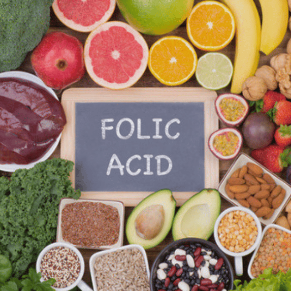 Folic acid rich foods and essential nutrients supporting female fertility, pregnancy preparation and healthy fetal development